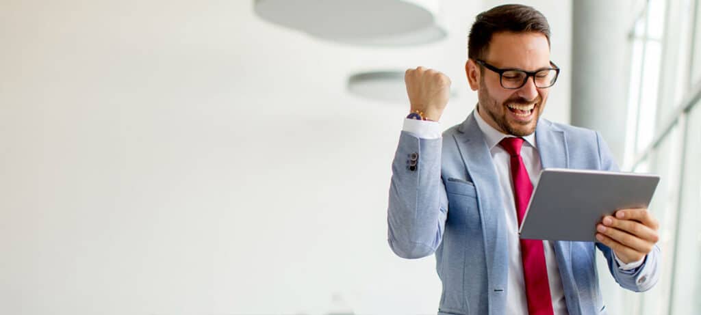 Man celebrating a sales award