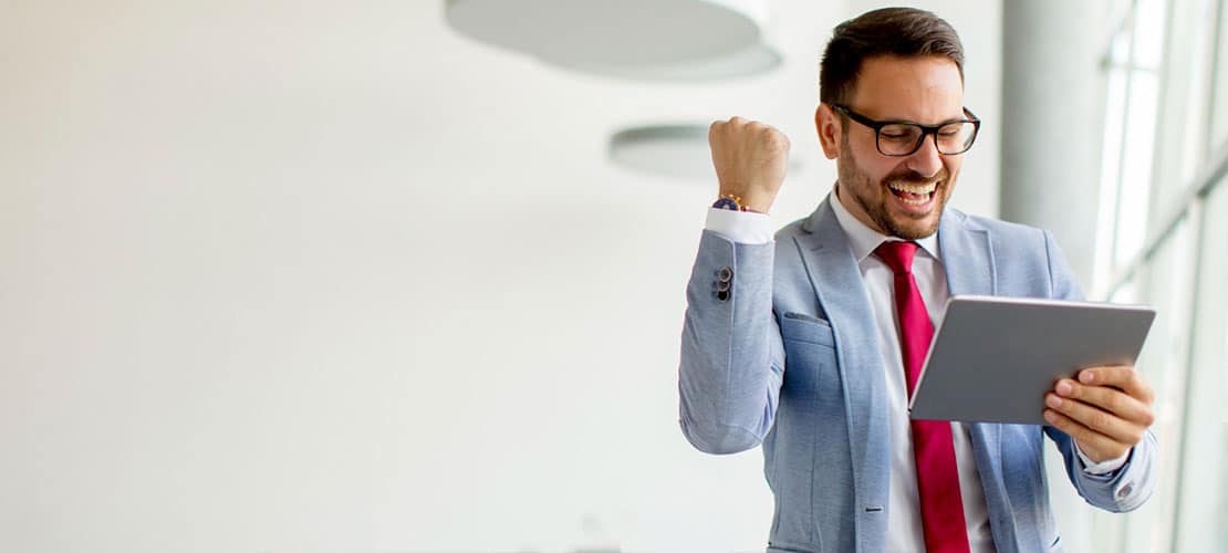 Man celebrating a sales award