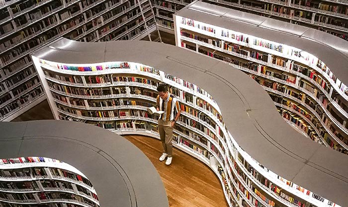 reading a book in a library