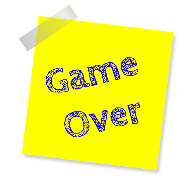 Game over sticky note reminder representing negative incentive consequences for poor workplace performance